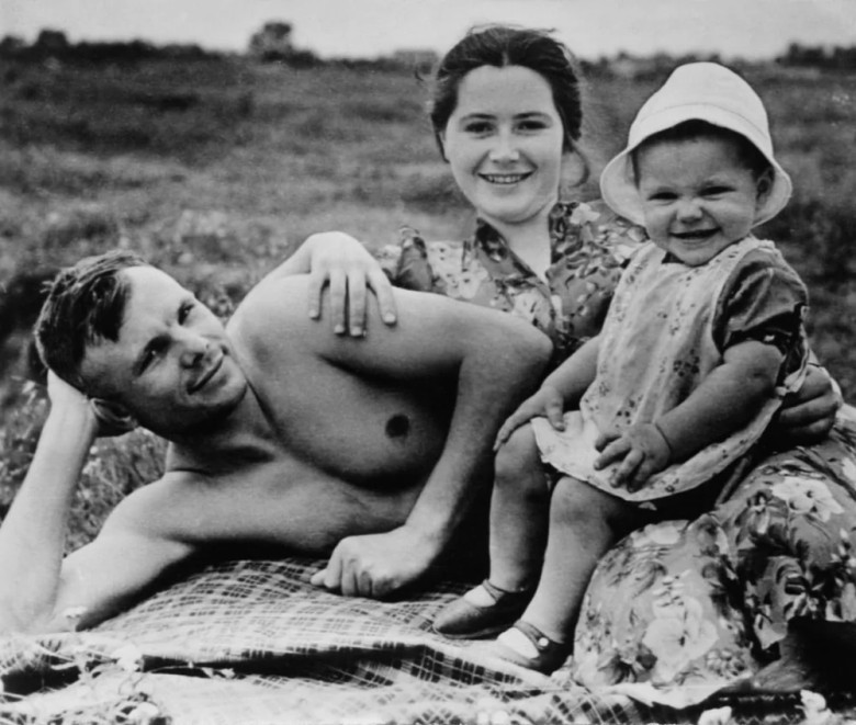 Yuri Gagarin and Family: A heartwarming image from 1960 captures the first human in space, Yuri Gagarin, enjoying a day at the beach with his wife Valentina and daughter Elena.